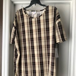 Small brown, cream and tan  Irma